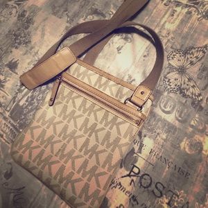 Micheal Kors cross bad!